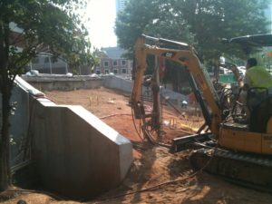 Micropiles being installed at construction site